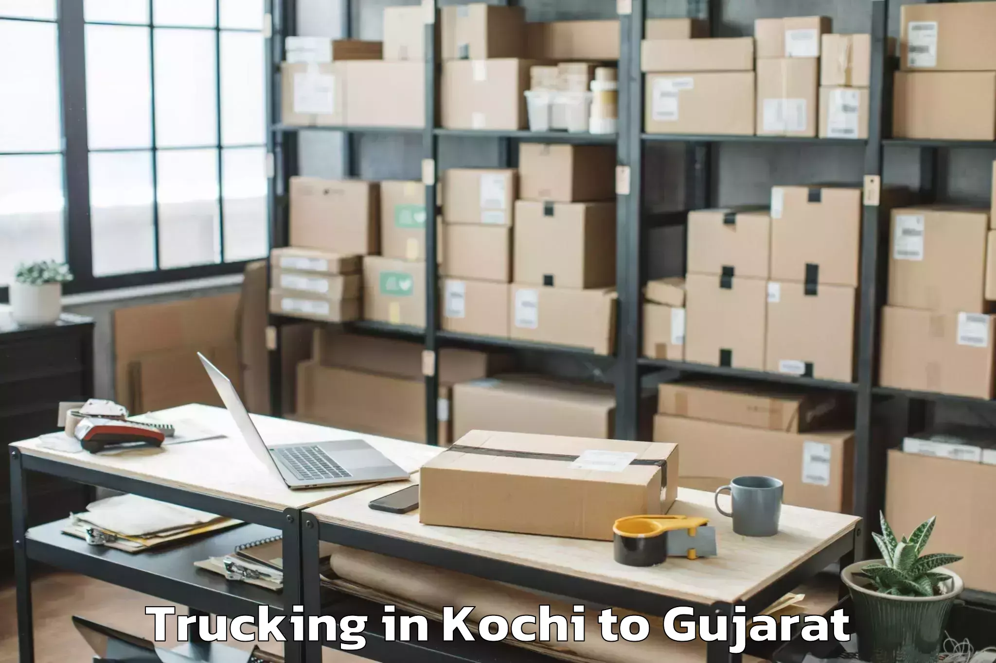 Leading Kochi to Nadiad Trucking Provider